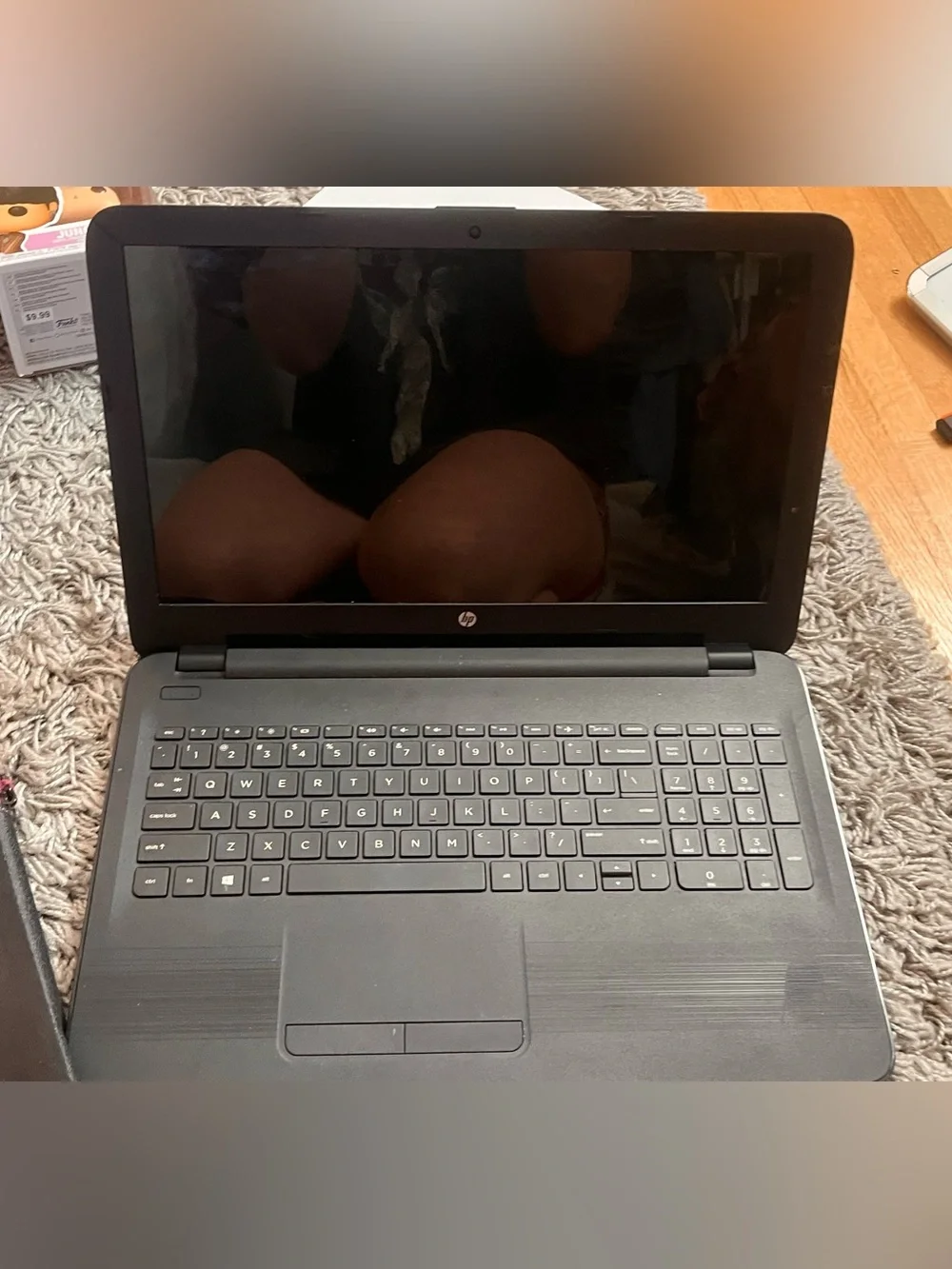 HP Black Laptop with Black Targus Sleeve and Pink Trim